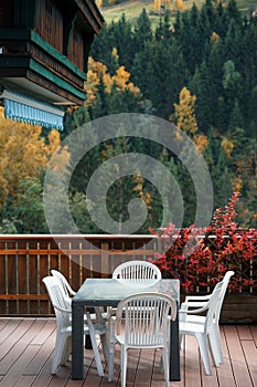 Cozy terrace with a table and chairs