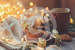 Cozy winter and Christmas setting with hot cocoa and homemade cookies