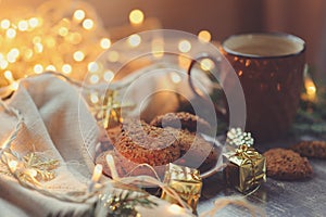 Cozy winter and Christmas setting with hot cocoa and homemade cookies photo