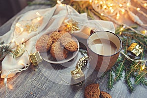 Cozy winter and Christmas setting with hot cocoa with marshmallows and homemade cookies