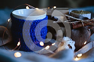 Cozy winter composition with eco gifts and christmas lights, flat lay, mock up