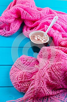 Cozy winter home background, cup of hot cocoa with marshmallow