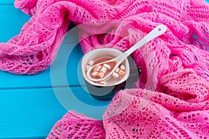 Cozy winter home background, cup of hot cocoa with marshmallow