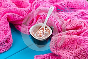 Cozy winter home background, cup of hot cocoa with marshmallow