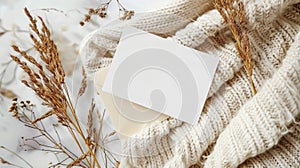 Cozy Winter Invitation Mockup with Knit Sweater and Rustic Dry Grass