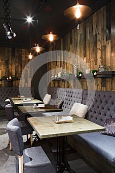 Cozy wooden interior of restaurant, copy space