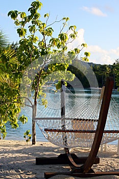 Cozy woven hammock by a tropical lagoon