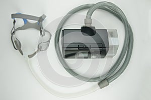 CPAP machine isolated on white background.