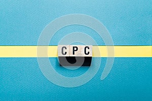 Cpc - cost per click word concept on cubes
