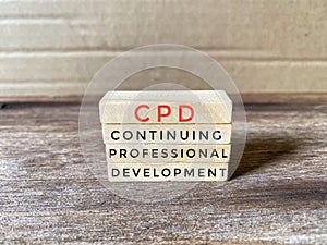 CPD acronym word on wood blocks.