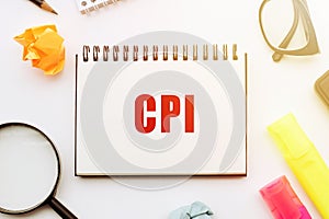 CPI word on a paper notapad, business concept