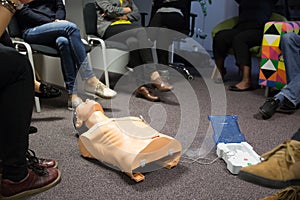 CPR course using automated external defibrillator device, AED.