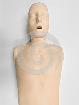 CPR dummy on white background for first aid and cardiopulmonary resuscitation training