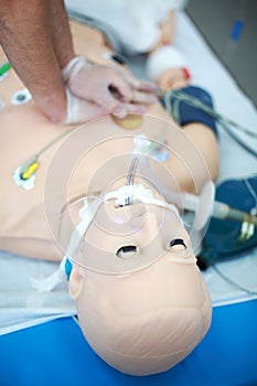 CPR. External heart massage in CPR training. Medical skills training. Modern technologies in training