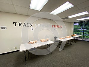 CPR training class with CPR dummy for first aid training