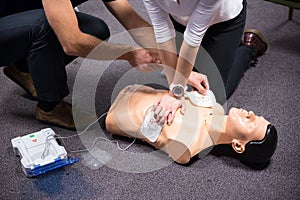 First Aid Training. Defibrillator CPR Practice