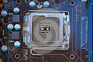CPU socket on the motherboard,close up of motherboard with empty socket under processor