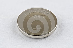 A CR2032 button cell lithium battery
