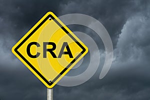 CRA Warning Sign with storm sky photo