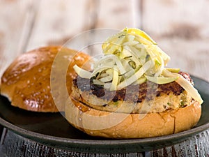 Crab cake sandwich with coleslaw garnish