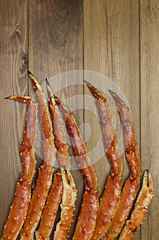 Crab claw on wooden background