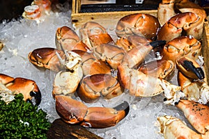 Crab claws on ice for sale at the fish market