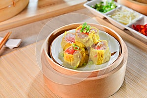 Crab Dumplings in chinese style in bamboo tray in asian restaurant
