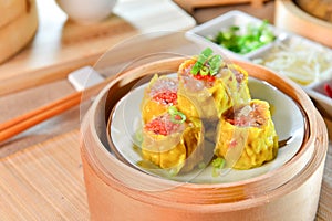 Crab Dumplings in chinese style in bamboo tray in asian restaurant