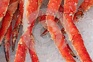 Crab legs on the ice in fish market