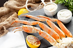 Crab legs. On a wooden table.