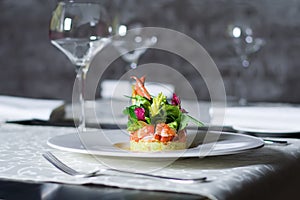 Crab meat appetizer, seafood delicacy in restaurant interior