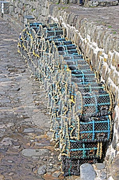 Crab pots at Clovelly harbour , Devon