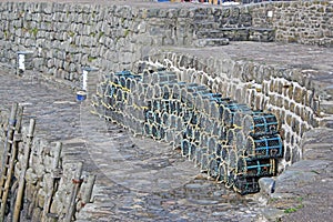 Crab pots at Clovelly harbour , Devon