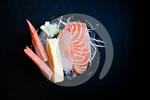 Crab stick or Kanikama , steamed egg and raw fish or salmon sashimi