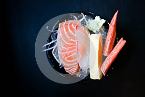 Crab stick or Kanikama , steamed egg and raw fish or salmon sashimi