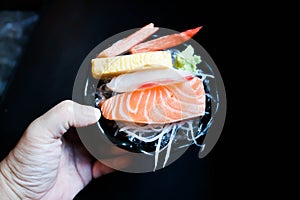Crab stick or Kanikama , steamed egg and raw fish or salmon sashimi