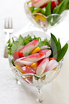 Crab stick with pepper and lettuce salad photo