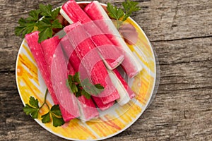 Crab sticks on rustic wooden table