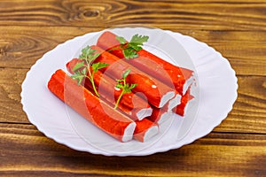 Crab sticks on wooden table