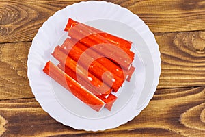 Crab sticks on wooden table