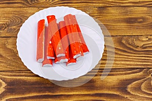 Crab sticks on wooden table