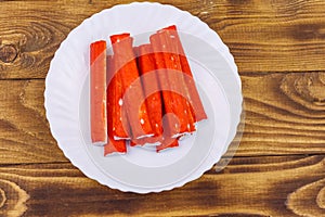 Crab sticks on wooden table