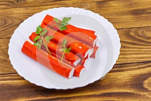 Crab sticks on wooden table