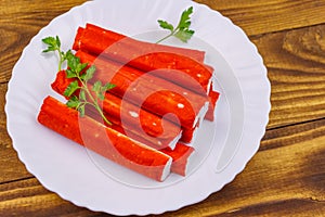 Crab sticks on wooden table