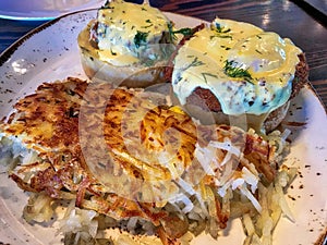 Crabcakes Benedict on the white plate