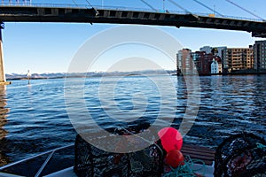 Crabpots loaded on Norway Motorboat to fish in the fjords during the winter time. Rogaland Norway