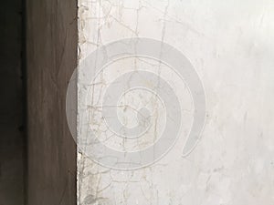 Crack on cement wall bare polished grey color and smooth surface texture concrete material vintage background detail architect con