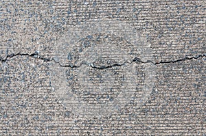 Crack on concrete road texture