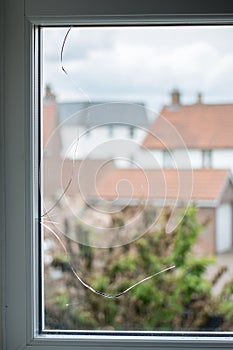 Crack in glass window pane.