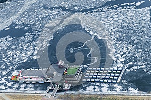 Crack on an ice surface of the frozen Han river and road top vie